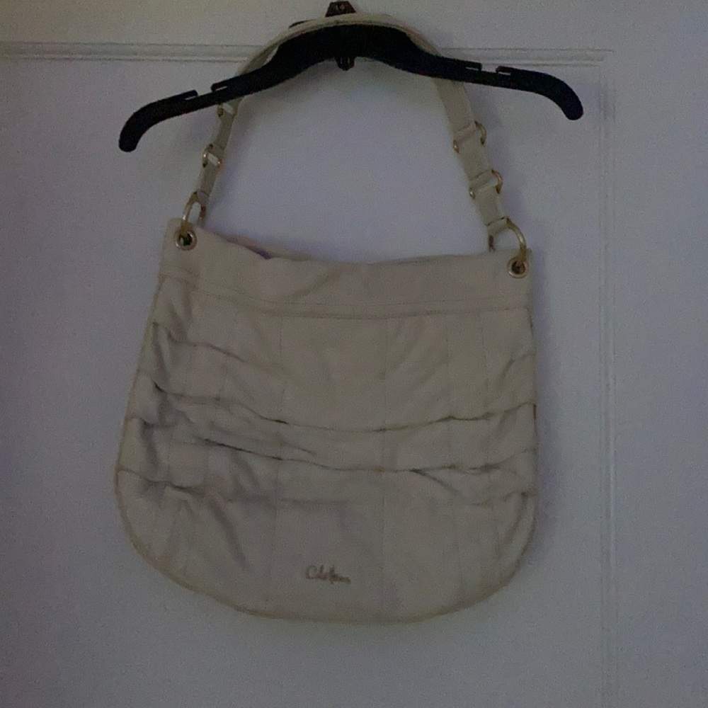 Cream leather Cole Haan shoulder bag.